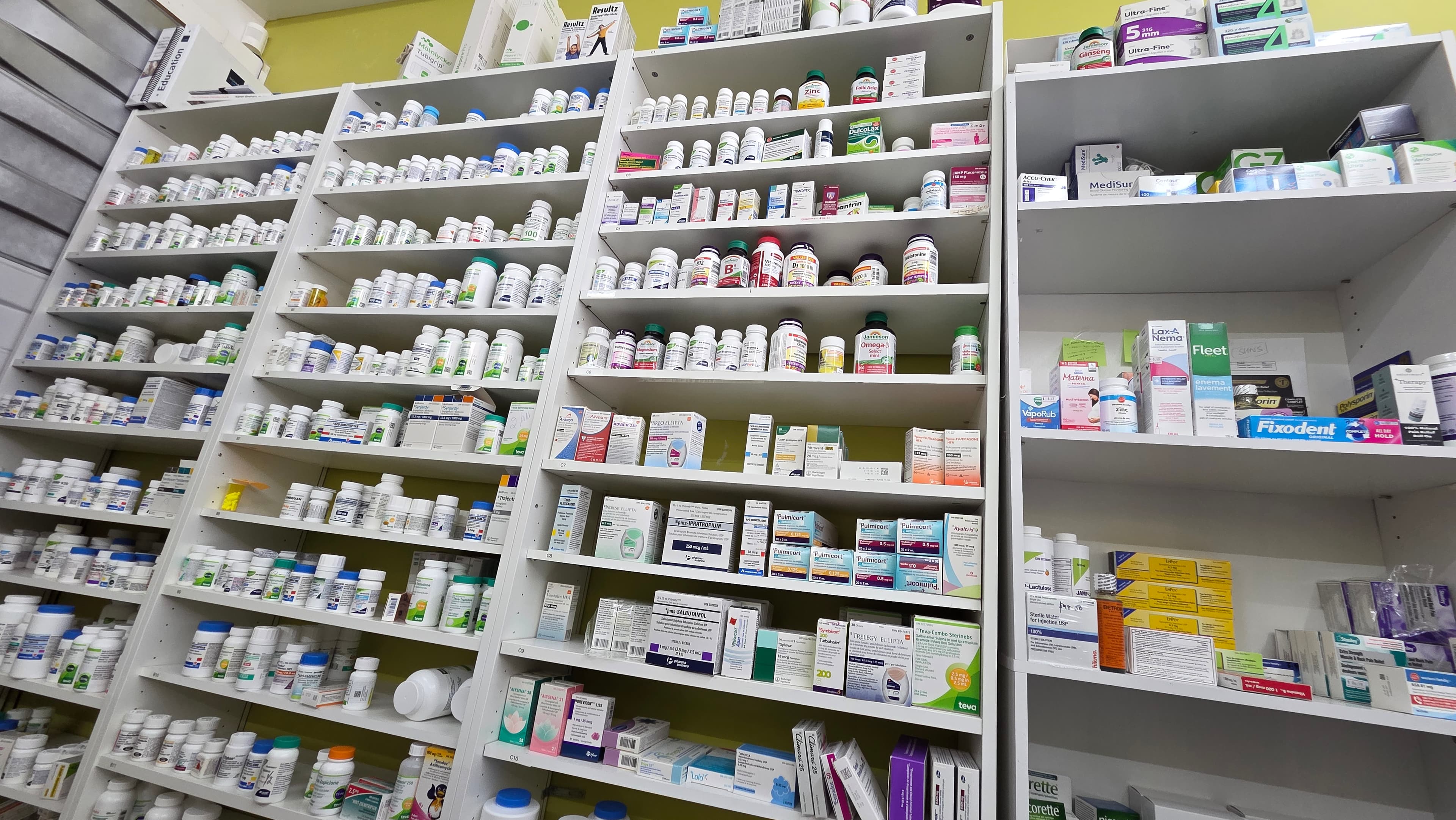 Dispensary shelves stocked with medications at Argyle Pharmacy, Port Alberni